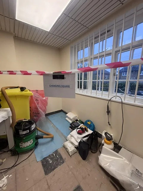 Asbestos floor tile and bitumen removal in Eltham