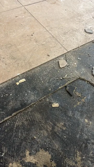 Black bitumen mastic floor removal in a SE9 flat